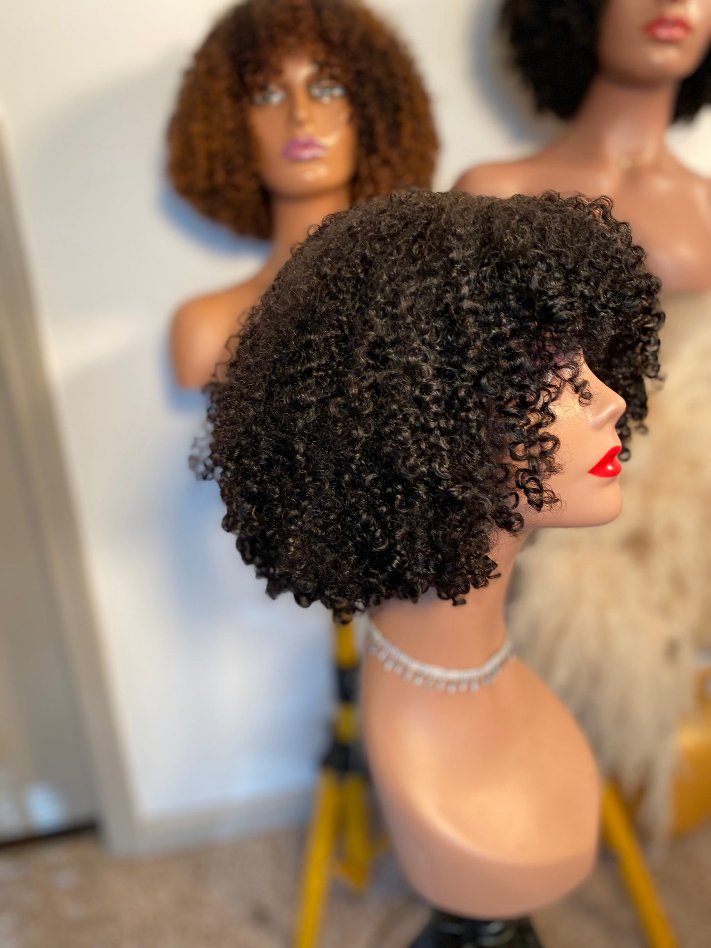 Kinky curly bang