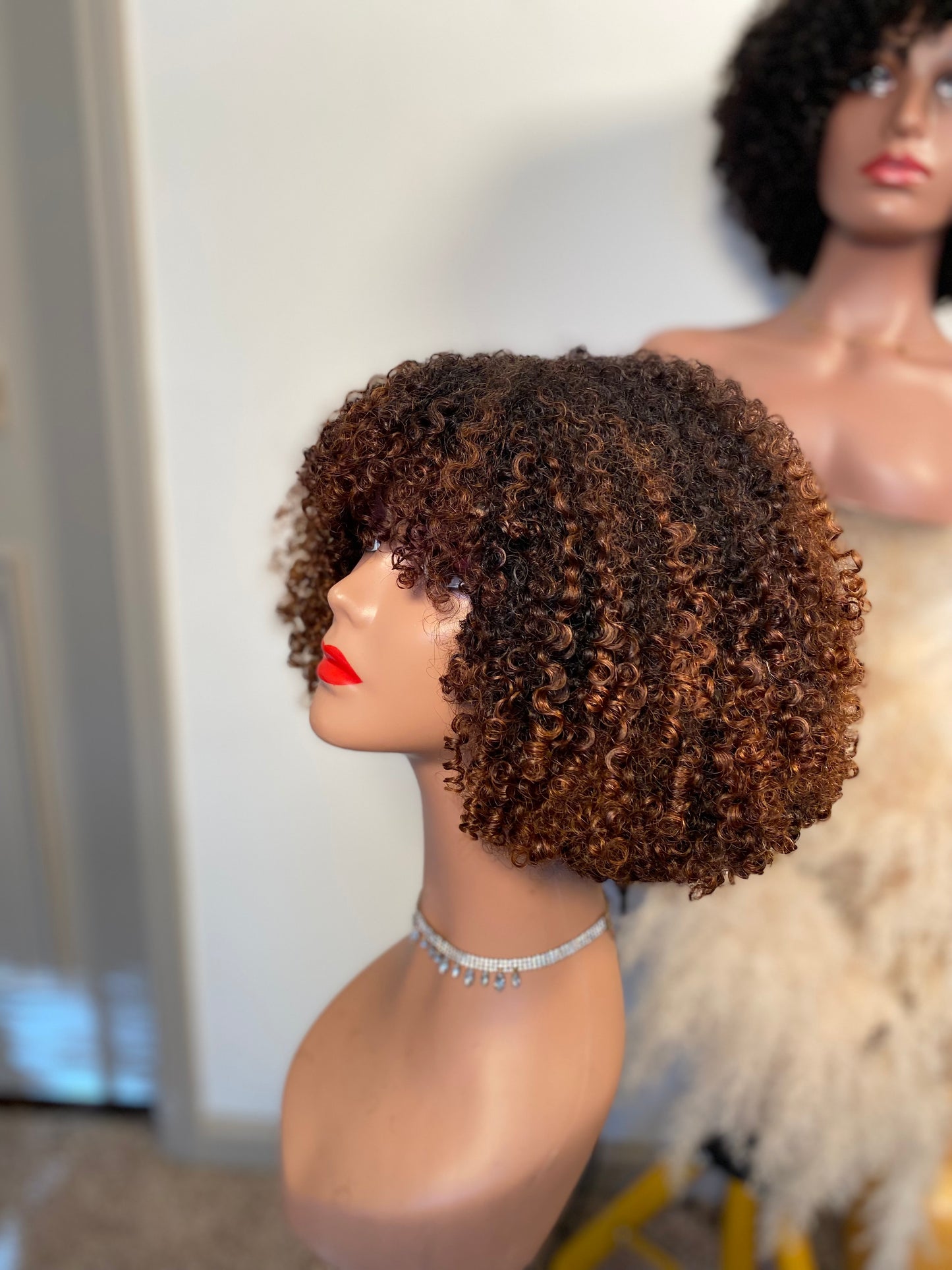 Kinky curly bang